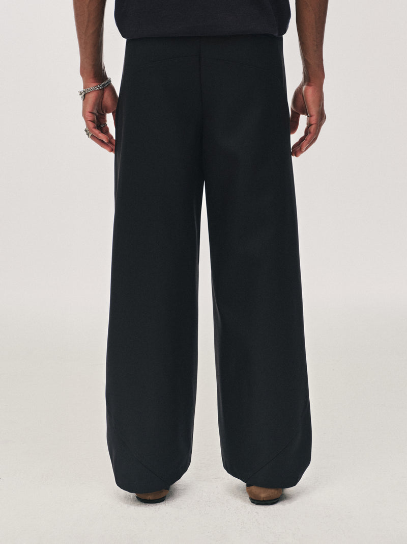 Pantalones de paneles plegados