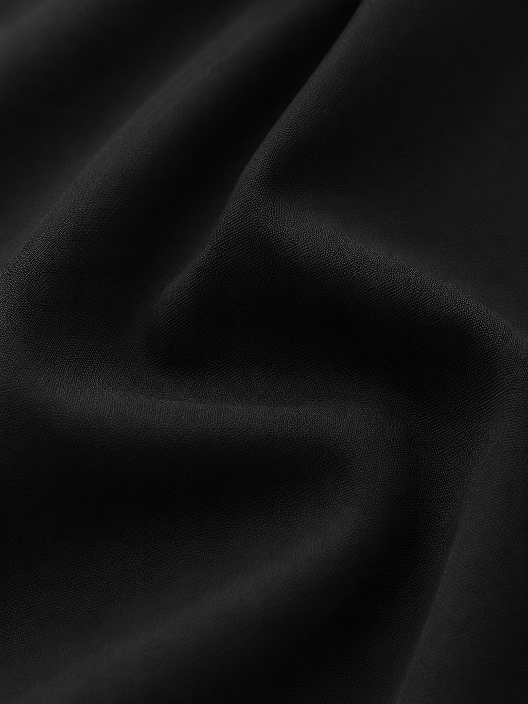 Pantalones drapeados