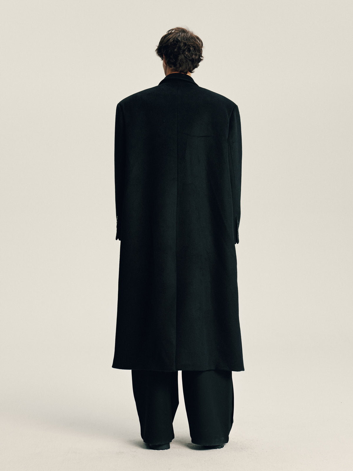 'Delayed' Wool Coat