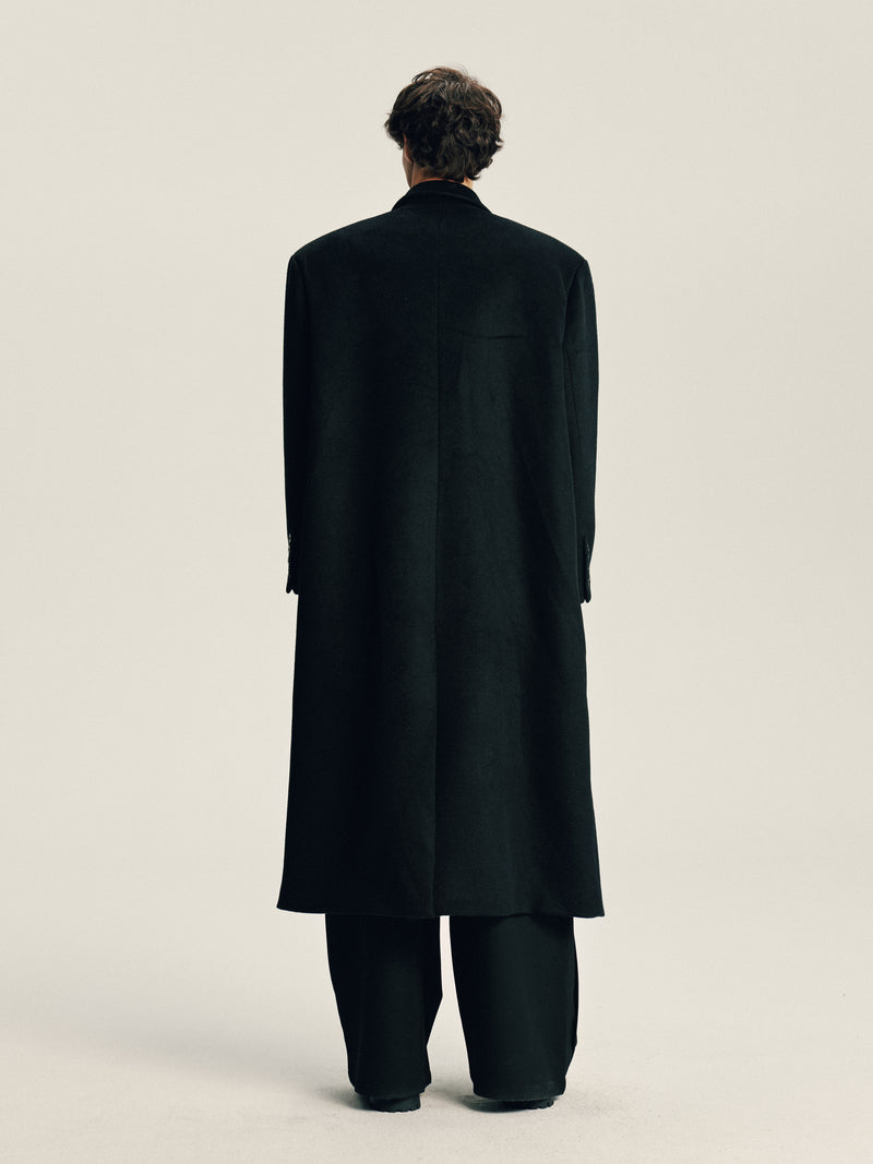 'Delayed' Wool Coat