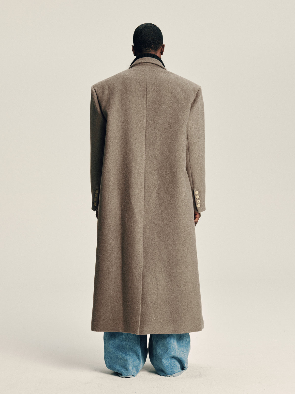 'Delayed' Wool Coat