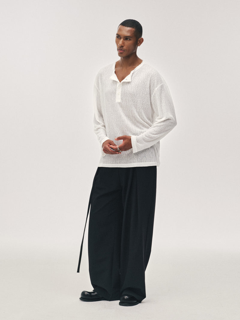 Pantalones drapeados